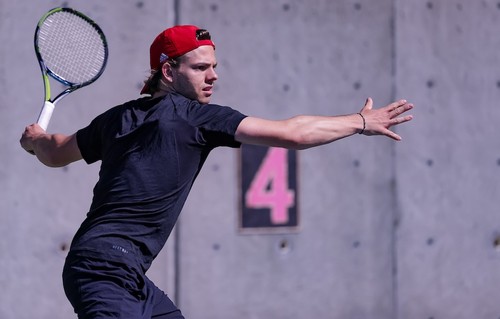 Julian Worn men tennis player on court