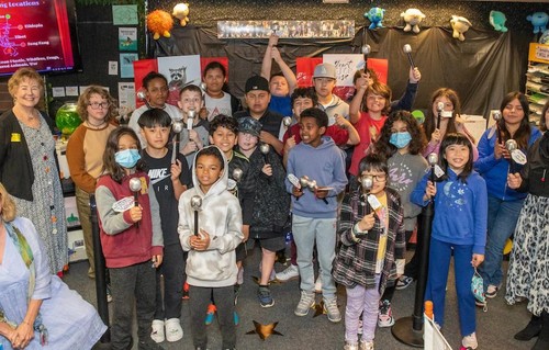 Teacher Barbara Bromley's 5th grade class at Hazelwood Elementary School, pictured alongside College of Education Professors Margit McGuire, PhD, (far left) and Laurie Stevahn, PhD (far right).