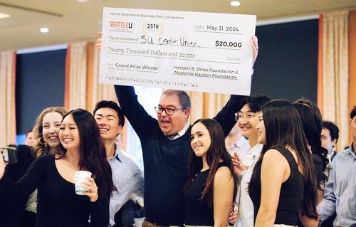 Members of the Seattle University Credit Union Initiative celebrate their win.