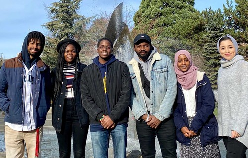 Students in the National Society of Black Engineers at the Quad Fountain