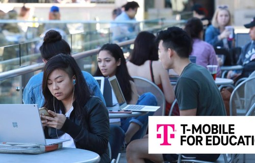 T Mobile logo overlayed on photo of students on campus with laptops