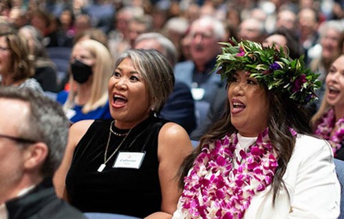 A photo featuring last year's alumni awards.