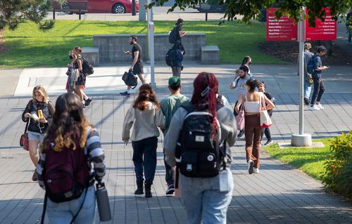Students walking across campus.