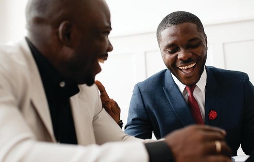 Colleagues meeting and laughing