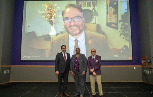At an event on March 11 to celebrate this new Hybrid Hub SU President Eduardo Peñalver (with Law Dean Anthony Varona on the screen) stands with UW Tacoma Chancellor Sheila Edwards Lange and UW Tacoma Assistant Chancellor for Community Engagement Ali Modarres. 