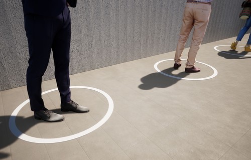 Two people standing in circles