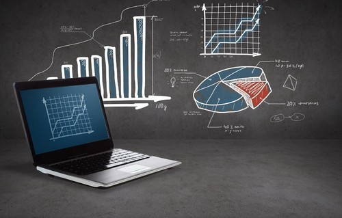Laptop, bar graphs, pie charts, and line graphs