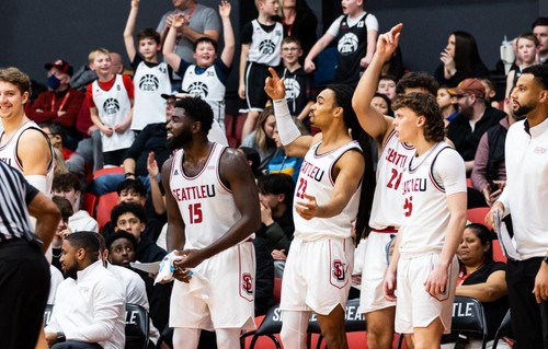 Men's basketball celebrates win
