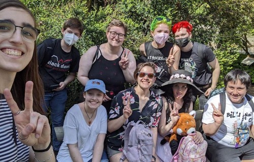 A group photo featuring members of the Triangle Club