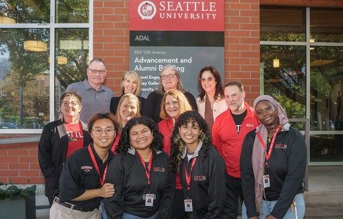 (l-r, back row) Bryan Brunette, '86, Kathleen Pellegrini, '86, Marla Momper, '87 and Sarah Owens, '88; (l-r, middle row) Katie Chapman, '98, '17, Katie Steele, Hilary Lichterman, Tim Albert, '92, '97; student leaders (l-r, front row): Vincent Lu'u, '25, Adrianna Martinez-Lainez, '24, Amaya Marin-Osorio, '25 and Coumba Kone, '25. 