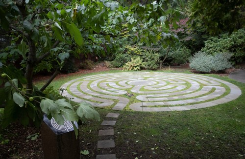 A labyrinth in the middle of a garden.