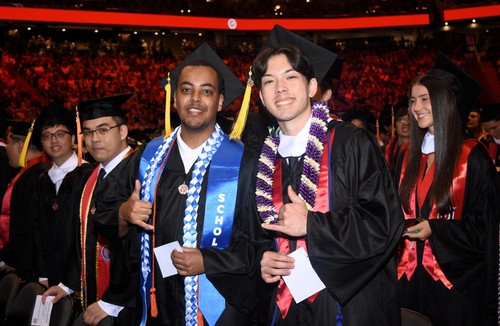 SU grads in regalia at commencement