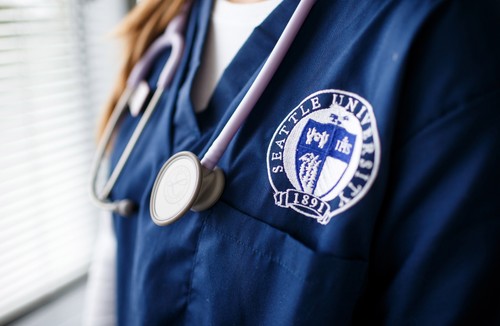 Close up of College of Nursing Scrubs
