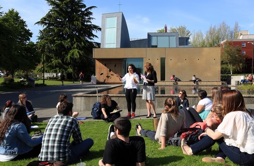 Teaching class outside the chapel