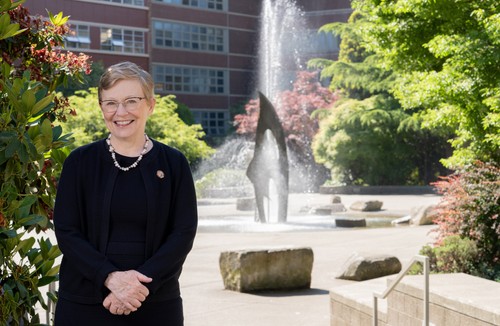 President-Elect Maura Mast in front of the fountain in the Quad