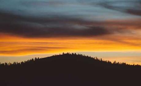 Sunset over a hill